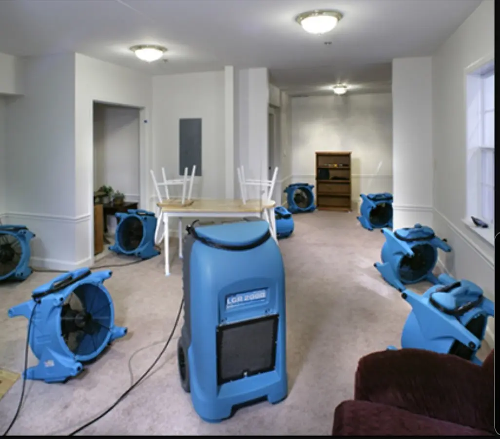 Air movers and dehumidifier setup for Water Damage Restoration in St. Helens